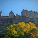 Edinburgh Castle above the Old Town rooftops, one of the best places to visit in Scotland