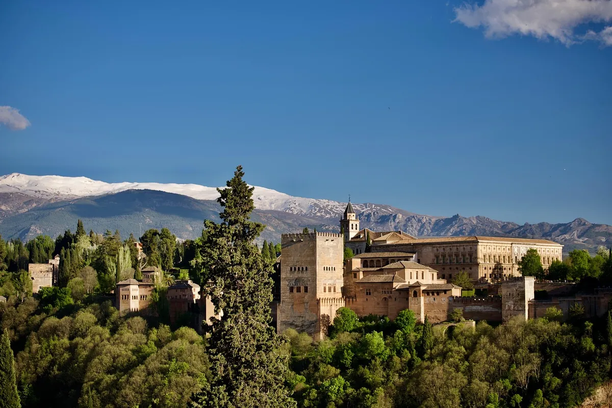 The Alhambra with the Sierra Nevada behind it, seen from the Albaicín in Granada